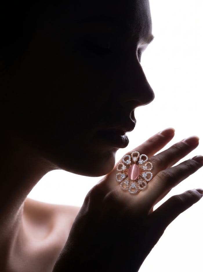Pink ring on hand